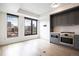 A kitchen shows stainless steel appliances and hardwood floors at 1750 Wewatta St # 1536, Denver, CO 80202