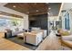 Stylish lounge area with modern seating, a fireplace, and a large television, ideal for relaxing at 1750 Wewatta St # 1536, Denver, CO 80202