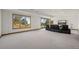 Finished basement media room with outside views and recessed lighting at 10985 Ambush Rock, Littleton, CO 80125