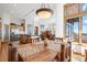 Cozy dining area flows into open living space, perfect for entertaining and Gathering gatherings at 10985 Ambush Rock, Littleton, CO 80125