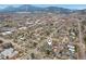 Beautiful aerial of neighborhood streets under mountain skyline, a pin marks the property at 1927 Pine St # B, Boulder, CO 80302