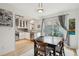 Bright dining area adjacent to kitchen with patio access at 1927 Pine St # B, Boulder, CO 80302