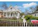 Charming historic home with a wraparound porch and beautifully landscaped front yard at 1927 Pine St # B, Boulder, CO 80302