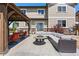 Spacious backyard patio featuring a gazebo and comfortable seating for outdoor living at 15352 E 117Th Ave, Commerce City, CO 80022