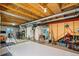 Unfinished basement with exposed ceiling and utilities, offering potential for customization at 15352 E 117Th Ave, Commerce City, CO 80022