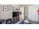 Themed bedroom with TV, memorabilia, and whimsical wall decorations at 15352 E 117Th Ave, Commerce City, CO 80022