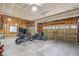 Spacious two-car garage with ample storage space and two motorcycles parked inside at 15352 E 117Th Ave, Commerce City, CO 80022