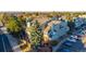 Aerial view of a charming townhouse community with green landscaping and ample parking at 919 S Dawson Way # 7, Aurora, CO 80012