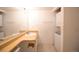 A bathroom complete with sink, vanity and a washer and dryer at 919 S Dawson Way # 7, Aurora, CO 80012