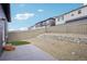 This backyard has a retaining wall, rock garden, and artificial lawn at 17673 Brass Buckle Way, Monument, CO 80132