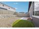 This backyard has an artificial lawn and rock garden for low maintenance at 17673 Brass Buckle Way, Monument, CO 80132
