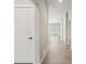 Hallway view to a living space that gets a lot of natural light at 17673 Brass Buckle Way, Monument, CO 80132