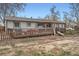 Large backyard with a wooden deck and grill at 2904 S Idalia St, Aurora, CO 80013