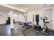 The basement includes workout equipment, a bench, and a punching bag for a home gym at 2904 S Idalia St, Aurora, CO 80013