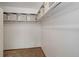 Walk-in closet with built-in shelves, providing ample storage space at 625 S Alton Way # 10D, Denver, CO 80247