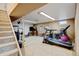 Finished basement featuring a home gym with exercise equipment at 1425 S Newport St, Denver, CO 80224