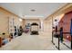 Spacious basement features neutral carpeting and workout machines at 1425 S Newport St, Denver, CO 80224