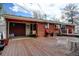 Spacious backyard deck perfect for outdoor dining and entertaining with ample seating at 1425 S Newport St, Denver, CO 80224