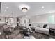 Open living space with kitchen, dining area and living area, seamlessly integrated for modern living at 14998 Cast Pebble Cir, Parker, CO 80134