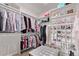 Walk-in closet featuring extensive built-in shelving and clothing racks at 14998 Cast Pebble Cir, Parker, CO 80134