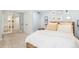 Relaxing bedroom with neutral tones, a soft carpet, and comfortable bedding, great for resting at 1767 S Sherman St, Denver, CO 80210