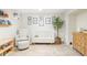 Cozy Bedroom with comfortable seating, modern crib, decorative artwork, and a stylish dresser, a relaxing space at 1767 S Sherman St, Denver, CO 80210