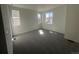 Empty bedroom with carpet and natural light at 22813 E Tufts Ave # B, Aurora, CO 80015