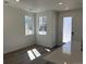 Well lit dining area features wood floors, neutral walls and natural light at 22813 E Tufts Ave # B, Aurora, CO 80015