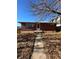 Charming brick home with a well-maintained front yard and walkway to the entrance at 1265 Yates St, Denver, CO 80204
