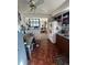 Functional kitchen space with wood floors and a view into the living room at 1265 Yates St, Denver, CO 80204