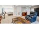 Finished basement with neutral carpet and adjacent bedroom space at 6774 St Vrain Ranch Blvd, Firestone, CO 80504