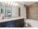 Bathroom featuring a tile backsplash, bath, and shower at 6774 St Vrain Ranch Blvd, Firestone, CO 80504