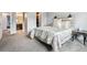 Bedroom featuring a bed, carpeted floors, and an open closet at 6774 St Vrain Ranch Blvd, Firestone, CO 80504