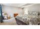 Bedroom featuring a bed, chair, and carpeted floors at 6774 St Vrain Ranch Blvd, Firestone, CO 80504