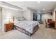 Large bedroom with an adjacent sitting area at 6774 St Vrain Ranch Blvd, Firestone, CO 80504