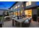 Backyard with a spacious deck for entertaining with a grilling and seating area at 6175 Puma Sands, Lone Tree, CO 80124