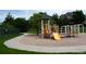 Community playground featuring a slide, climbing structures, and a soft landing area, safe for children at 6175 Puma Sands, Lone Tree, CO 80124