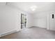 Bright bedroom with sliding glass doors to balcony and mountain views at 448 Brook Rd, Evergreen, CO 80439