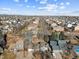 Aerial view of a residential neighborhood showcasing various houses and landscaping at 8773 W Star Dr, Littleton, CO 80128