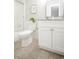 Bathroom featuring updated vanity with granite countertop, stylish fixtures, and a shower at 3855 S Monaco St # 208, Denver, CO 80237