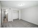 Spacious bedroom featuring plush carpet and closet at 3855 S Monaco St # 208, Denver, CO 80237