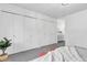 Bedroom has large closets with a view into the bathroom at 4248 Corriente Pl, Boulder, CO 80301