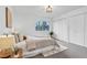Bedroom includes a large window with natural light, large closets and neutral colored furnishings at 4248 Corriente Pl, Boulder, CO 80301