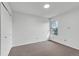 Cozy bedroom with neutral carpet, a single window, and ample natural light at 4248 Corriente Pl, Boulder, CO 80301