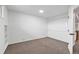 A clean, empty bedroom with neutral carpet and white walls at 4248 Corriente Pl, Boulder, CO 80301