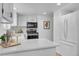 This stylish kitchen comes complete with an island and stainless steel appliances at 4248 Corriente Pl, Boulder, CO 80301