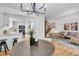 Open-concept living space with updated kitchen, dining area, and cozy living room with natural light at 4248 Corriente Pl, Boulder, CO 80301