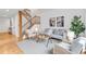 Bright living room with a staircase and modern decor at 4248 Corriente Pl, Boulder, CO 80301