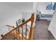 Looking down the stairs into the living room featuring contemporary furnishings and an attached bedroom at 4248 Corriente Pl, Boulder, CO 80301