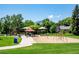 Community park playground with swings, slides and picnic areas for Gathering fun against a mountain backdrop at 4248 Corriente Pl, Boulder, CO 80301